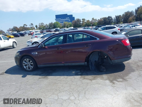 2011 Ford Taurus SEL with VIN 1FAHP2EW8BG137937, listed as a IAAI auction lot 42107586 with 143,525 mi miles. Bid and sale history available at carsss.com. Image 15.