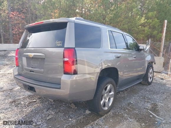 2017 Chevrolet Tahoe LS with VIN 1GNSCAKC7HR179715, listed as a IAAI auction lot 40948996 with 164,178 mi miles. Bid and sale history available at carsss.com. Image 4.