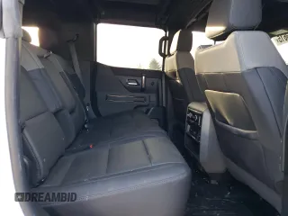 2025 GMC Hummer EV 2X with VIN 1GKB0NDE5SU102096, listed as a Copart auction lot 47083615 with 8,713 mi miles and Salvage Title. Bid and sale history available at carsss.com. Image 11.