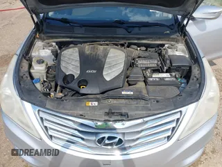 2012 Hyundai Azera z VIN KMHFH4JGXCA182208, wystawiony jako IAAI lot #42559319 z przebiegiem 236 086 mil mil oraz . Historia ofert i sprzedaży dostępna na DreamBid. Obrazek 10.