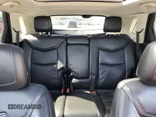 2019 Cadillac XT5 Premium Luxury FWD z VIN 1GYKNERS5KZ235627, wystawiony jako Copart lot #52512755 z przebiegiem Nie podano mil oraz Szkody całkowita. Historia ofert i sprzedaży dostępna na DreamBid. Obrazek 10.