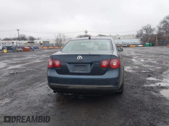 2009 Volkswagen Jetta SE z VIN 3VWRZ71K49M016683, wystawiony jako IAAI lot #41530644 z przebiegiem 106 148 mil mil oraz . Historia ofert i sprzedaży dostępna na DreamBid. Obrazek 16.