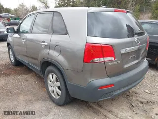 2011 Kia Sorento LX with VIN 5XYKT3A1XBG186877, listed as a IAAI auction lot 41819079 with 230,122 mi miles. Bid and sale history available at carsss.com. Image 3.