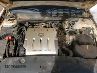 2004 Cadillac DeVille z VIN 1G6KD54Y54U181978, wystawiony jako Copart lot #47458905 z przebiegiem 145 708 mil mil oraz Szkody całkowita. Historia ofert i sprzedaży dostępna na DreamBid. Obrazek 12.
