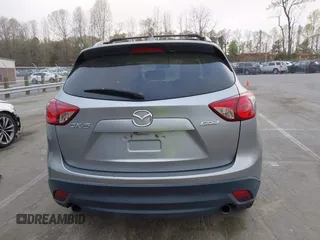 2013 Mazda CX-5 Touring with VIN JM3KE2CE0D0105115, listed as a IAAI auction lot 41899956 with 301,264 mi miles. Bid and sale history available at carsss.com. Image 16.