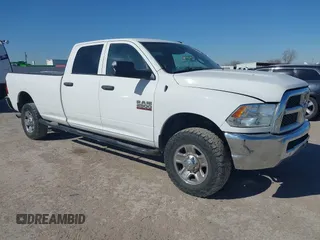 2015 Ram 2500 Tradesman z VIN 3C6UR5HL8FG670037, wystawiony jako IAAI lot #41410963 z przebiegiem 309 304 mil mil oraz . Historia ofert i sprzedaży dostępna na DreamBid. Obrazek 1.