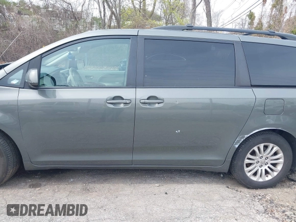 2012 Toyota Sienna XLE AAS with VIN 5TDYK3DC1CS199113, listed as a IAAI auction lot 42123757 with 211,723 mi miles and . Bid and sale history available at carsss.com. Image 14.