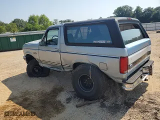 1996 Ford Bronco Custom with VIN 1FMEU15H2TLA98333, listed as a Copart auction lot 67065144 with 347,019 mi miles and Salvage Title. Bid and sale history available at carsss.com. Image 2.