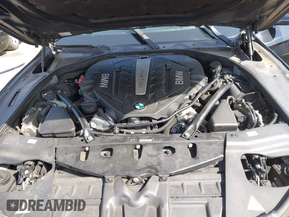 2013 BMW 6 Series 650i with VIN WBAYM9C57DDW20178, listed as a IAAI auction lot 41933561 with 72,886 mi miles and . Bid and sale history available at carsss.com. Image 10.