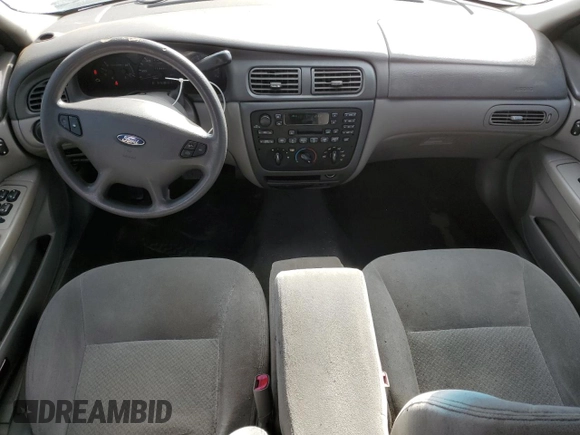2003 Ford Taurus LX Standard z VIN 1FAFP52U43A110444, wystawiony jako Copart lot #83557764 z przebiegiem 118 897 mil mil oraz Szkoda całkowita • Salvage title. Historia ofert i sprzedaży dostępna na DreamBid. Obrazek 8.