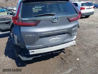 2022 Honda CR-V Hybrid EX-L with VIN 5J6RT6H83NL032596, listed as a IAAI auction lot 41831447 with 113,751 mi miles. Bid and sale history available at carsss.com. Image 6.