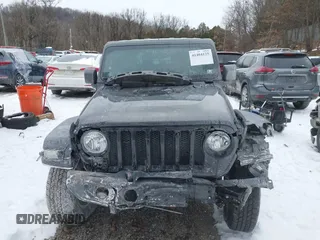 2020 Jeep Wrangler Willys z VIN 1C4GJXAG1LW118348, wystawiony jako IAAI lot #41404125 z przebiegiem 35 325 mil mil oraz . Historia ofert i sprzedaży dostępna na DreamBid. Obrazek 13.