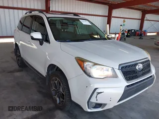 2014 Subaru Forester XT Touring z VIN JF2SJGMC0EH422802, wystawiony jako IAAI lot #42875557 z przebiegiem 235 946 mil mil oraz . Historia ofert i sprzedaży dostępna na DreamBid. Obrazek 1.