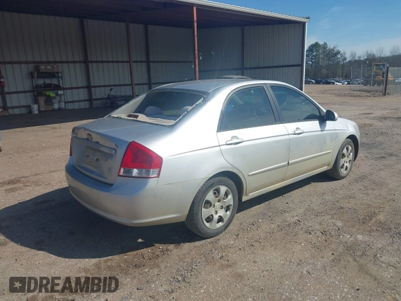 2009 Kia Spectra EX with VIN KNAFE221995647605, listed as a IAAI auction lot 41680420 with 169,000 mi miles. Bid and sale history available at carsss.com. Image 4.