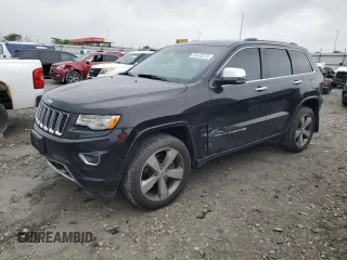 2015 Jeep Grand Cherokee Overland with VIN 1C4RJFCT2FC762573, listed as a Copart auction lot 59123275 with 229,128 mi miles and Salvage title. Bid and sale history available at DreamBid. Image 1.
