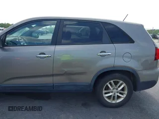 2014 Kia Sorento LX with VIN 5XYKT3A60EG486699, listed as a IAAI auction lot 42143270 with 127,190 mi miles and . Bid and sale history available at DreamBid. Image 12.
