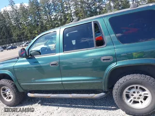 1999 Dodge Durango with VIN 1B4HS28Z3XF521133, listed as a IAAI auction lot 42068475 with 229,651 mi miles. Bid and sale history available at carsss.com. Image 14.