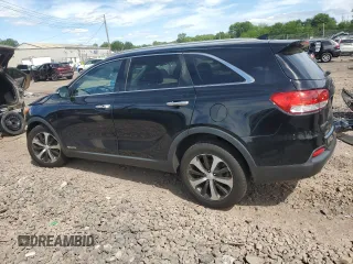 2017 Kia Sorento EX with VIN 5XYPHDA55HG201570, listed as a Copart auction lot 57595985 with 129,698 mi miles and Salvage title. Bid and sale history available at DreamBid. Image 2.