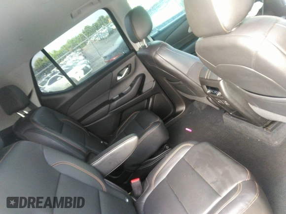 2021 Chevrolet Traverse LT with VIN 1GNERHKW6MJ157311, listed as a IAAI auction lot 42256458 with 97,635 mi miles and . Bid and sale history available at DreamBid. Image 8.