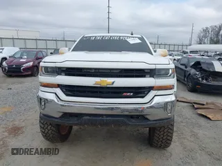 2017 Chevrolet Silverado 1500 LT with VIN 3GCUKREC7HG100199, listed as a IAAI auction lot 41542046 with 224,692 mi miles and . Bid and sale history available at DreamBid. Image 12.