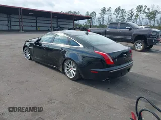 2015 Jaguar XJ with VIN SAJWA1CZ9F8V78228, listed as a IAAI auction lot 41260138 with 52,622 mi miles. Bid and sale history available at carsss.com. Image 3.