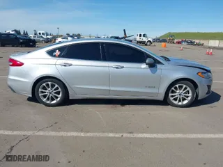 2019 Ford Fusion Hybrid SE with VIN 3FA6P0LU2KR188503, listed as a IAAI auction lot 41846755 with 67,906 mi miles. Bid and sale history available at carsss.com. Image 13.