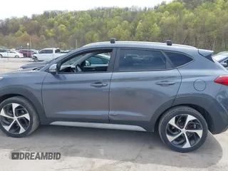 2017 Hyundai Tucson Sport with VIN KM8J3CA21HU407189, listed as a IAAI auction lot 42090562 with 113,618 mi miles. Bid and sale history available at carsss.com. Image 14.
