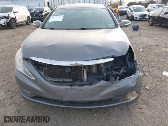 2014 Hyundai Sonata Limited with VIN 5NPEC4AB9EH897799, listed as a IAAI auction lot 40771774 with 221,000 mi miles and . Bid and sale history available at DreamBid. Image 6.