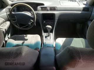 2001 Toyota Camry LE z VIN JT2BF22K010329017, wystawiony jako Copart lot #56035725 z przebiegiem 200 841 mil mil oraz Szkoda całkowita • Salvage title. Historia ofert i sprzedaży dostępna na DreamBid. Obrazek 8.