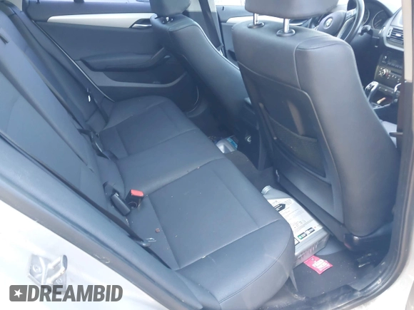 2015 BMW X1 sDrive28i z VIN WBAVM1C58FV318836, wystawiony jako IAAI lot #42185975 z przebiegiem 203 744 mil mil oraz . Historia ofert i sprzedaży dostępna na DreamBid. Obrazek 8.