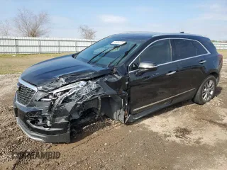 2021 Cadillac XT5 FWD Premium Luxury with VIN 1GYKNCRS1MZ107036, listed as a Copart auction lot 45534075 with 66,813 mi miles and Salvage Title. Bid and sale history available at carsss.com. Image 1.