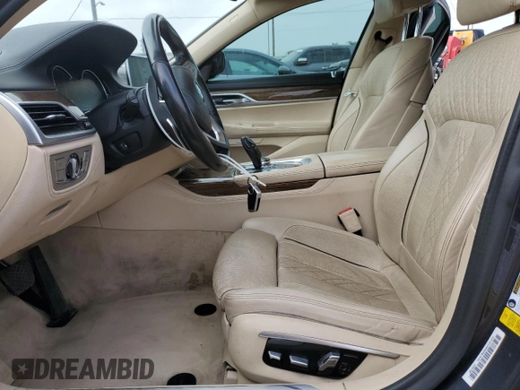 2016 BMW 7 Series 740i with VIN WBA7E2C51GG546677, listed as a Copart auction lot 63455445 with 106,553 mi miles and Salvage title. Bid and sale history available at DreamBid. Image 7.