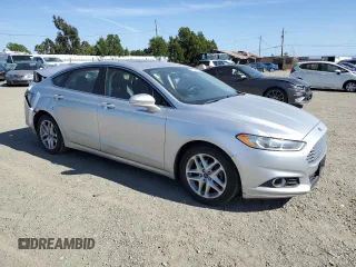 2015 Ford Fusion SE with VIN 3FA6P0HD8FR137683, listed as a Copart auction lot 57684495 with 115,282 mi miles and Salvage title. Bid and sale history available at DreamBid. Image 4.
