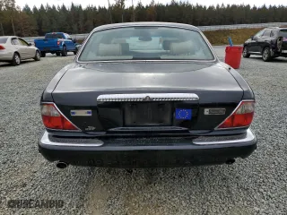 2003 Jaguar XJ VDP with VIN SAJDA24CX3LF55964, listed as a Copart auction lot 79812444 with 173,281 mi miles and Salvage Title. Bid and sale history available at carsss.com. Image 6.