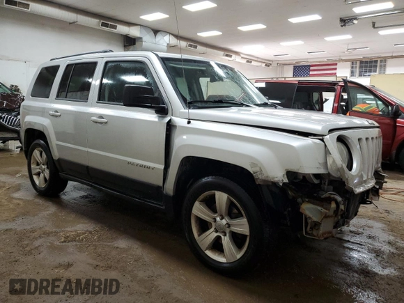2012 Jeep Patriot with VIN 1C4NJPAB5CD558435, listed as a Copart auction lot 69703064 with 218,420 mi miles and Clean title. Bid and sale history available at DreamBid. Image 4.