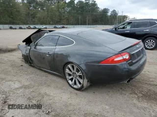 2013 Jaguar XK with VIN SAJWA4FB0DLB51078, listed as a Copart auction lot 82687264 with 0 mi miles and Salvage Title. Bid and sale history available at carsss.com. Image 2.