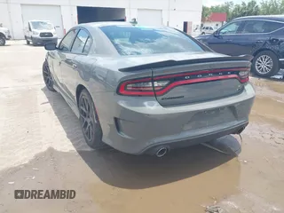 2019 Dodge Charger Scat Pack with VIN 2C3CDXGJ2KH633854, listed as a IAAI auction lot 42212517 with 74,285 mi miles and . Bid and sale history available at DreamBid. Image 3.