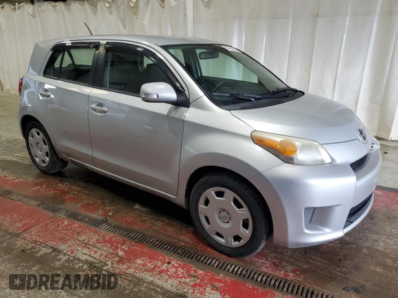 2009 Scion xD with VIN JTKKU10409J037250, listed as a Copart auction lot 52700595 with 210,907 mi miles and Clean Title. Bid and sale history available at carsss.com. Image 4.