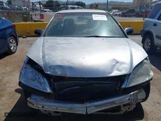 2005 Honda Civic LX with VIN 1HGEM21575L051616, listed as a IAAI auction lot 42067264 with 246,965 mi miles. Bid and sale history available at carsss.com. Image 6.