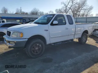 1997 Ford F-150 XL with VIN 1FTDX1866VKB08985, listed as a Copart auction lot 43708935 with 208,670 mi miles and Salvage title. Bid and sale history available at DreamBid. Image 1.