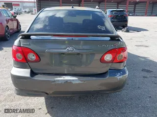 2007 Toyota Corolla CE with VIN 1NXBR32E97Z800352, listed as a IAAI auction lot 41970328 with 288,087 mi miles. Bid and sale history available at carsss.com. Image 6.