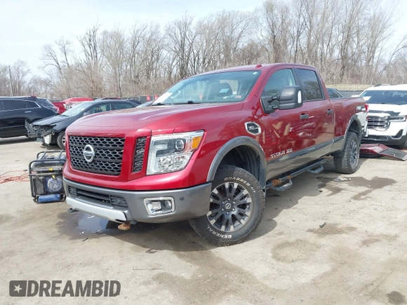 2016 Nissan Titan XD S with VIN 1N6AA1F43GN510841, listed as a IAAI auction lot 41814864 with 163,025 mi miles. Bid and sale history available at carsss.com. Image 2.
