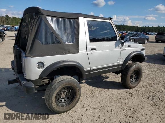 1987 Suzuki Samurai z VIN JS3JC51C3H4186141, wystawiony jako Copart lot #72551804 z przebiegiem 525 030 mil mil oraz Szkoda całkowita • Salvage title. Historia ofert i sprzedaży dostępna na DreamBid. Obrazek 3.