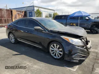 2015 Hyundai Azera Limited z VIN KMHFH4JG1FA453211, wystawiony jako Copart lot #51019915 z przebiegiem 122 712 mil mil oraz Szkoda całkowita • Salvage title. Historia ofert i sprzedaży dostępna na DreamBid. Obrazek 4.