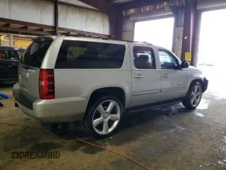 2013 Chevrolet Suburban LT with VIN 1GNSCJE00DR260275, listed as a Copart auction lot 50394425 with 140,464 mi miles and Salvage title. Bid and sale history available at DreamBid. Image 3.