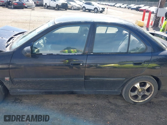 2006 Nissan Sentra SE-R Spec V z VIN 3N1AB51D46L495721, wystawiony jako IAAI lot #41886006 z przebiegiem 201 712 mil mil oraz . Historia ofert i sprzedaży dostępna na DreamBid. Obrazek 14.