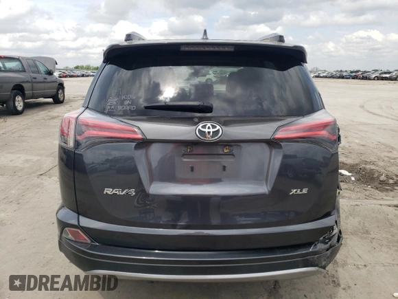 2017 Toyota RAV4 XLE with VIN JTMWFREV2HD108173, listed as a Copart auction lot 50767725 with 114,000 mi miles and Salvage Title. Bid and sale history available at DreamBid. Image 6.