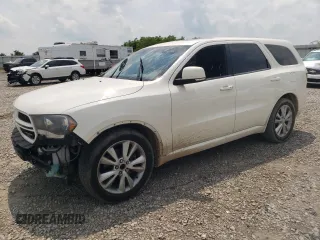 2012 Dodge Durango R/T z VIN 1C4SDJCTXCC147244, wystawiony jako Copart lot #59383015 z przebiegiem 230 839 mil mil oraz Szkoda całkowita • Salvage title. Historia ofert i sprzedaży dostępna na DreamBid. Obrazek 1.
