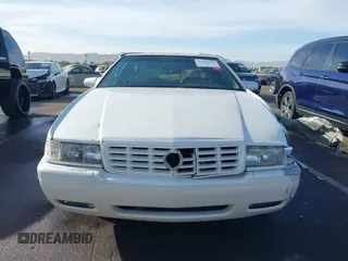 2001 Cadillac Eldorado Touring ETC z VIN 1G6ET12991B104624, wystawiony jako IAAI lot #41616324 z przebiegiem Nie podano mil oraz . Historia ofert i sprzedaży dostępna na DreamBid. Obrazek 12.