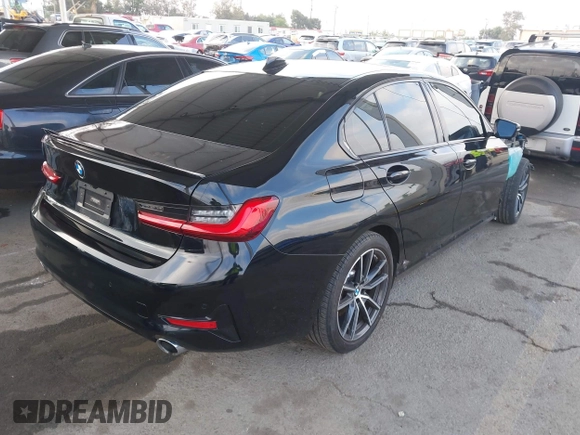 2020 BMW 3 Series 330i with VIN WBA5R1C07LFH37243, listed as a IAAI auction lot 42129217 with 22,767 mi miles. Bid and sale history available at carsss.com. Image 4.
